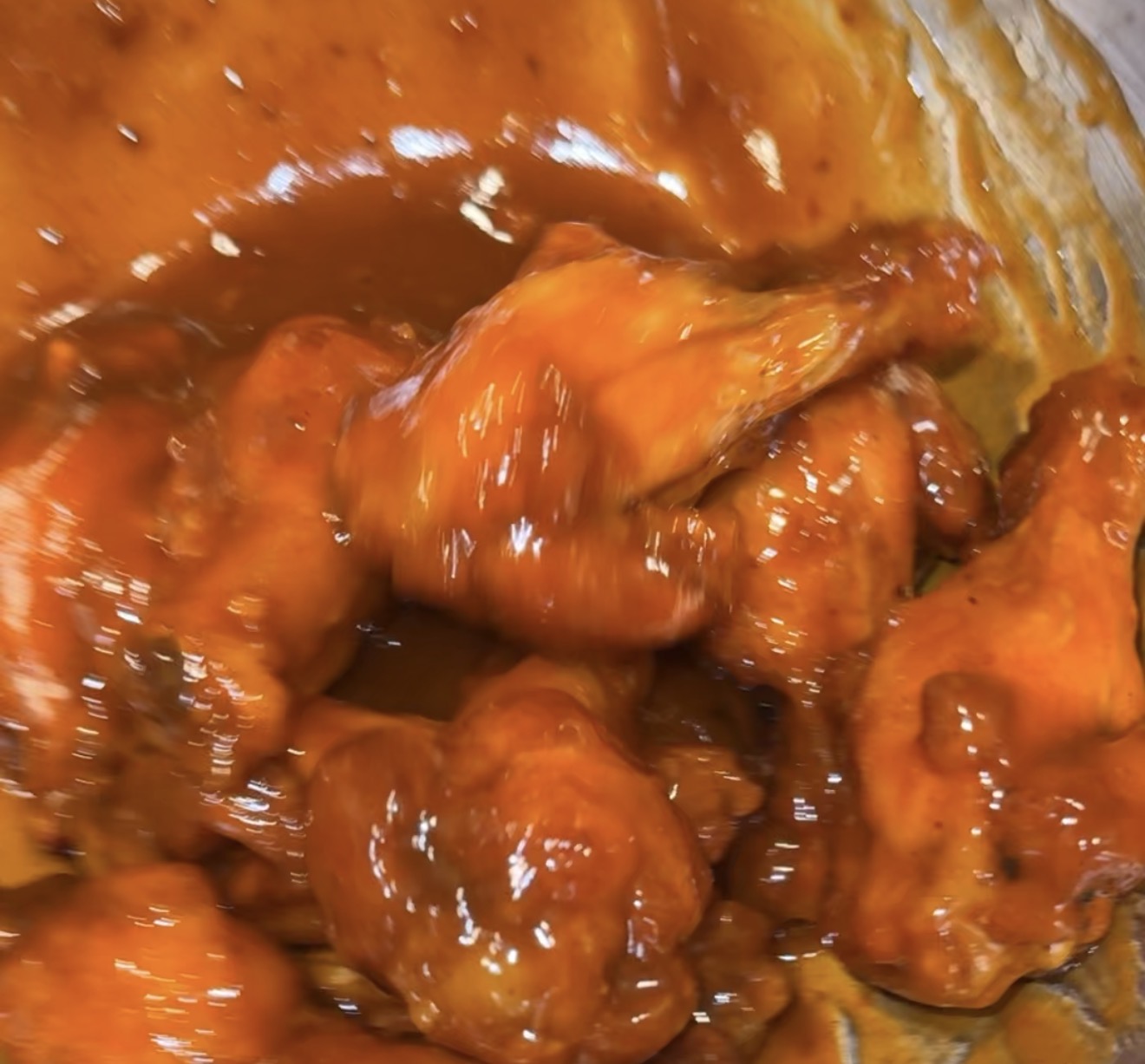Chicken wings tossed in sauce